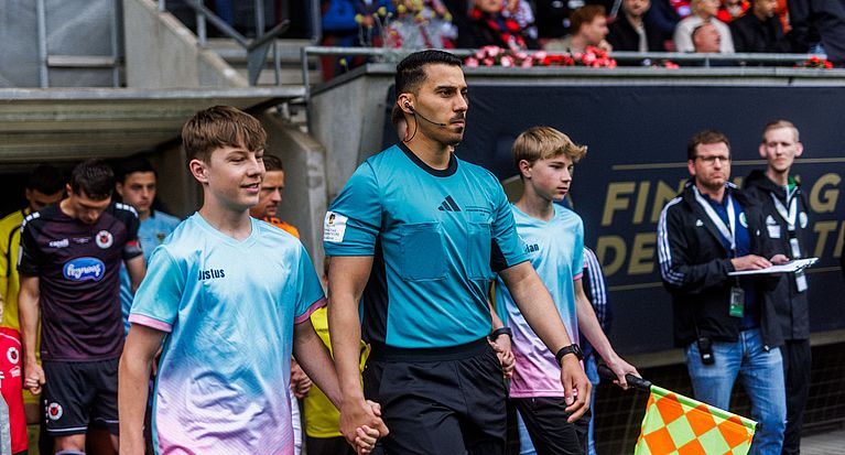 Tarik Damar pfeift Bitburger-Pokalfinale 2026